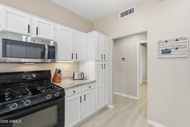 16046 W SENTINEL Drive, Sun City West, AZ 85375