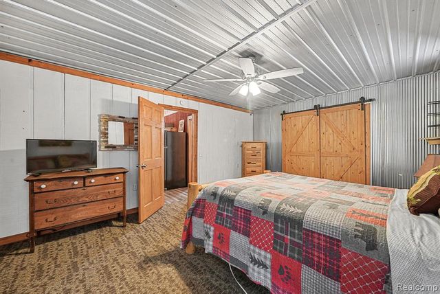 8074 Grosbeak Drive, Alden, MI 49612