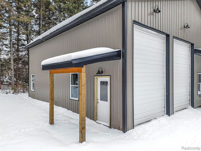 8074 Grosbeak Drive, Alden, MI 49612