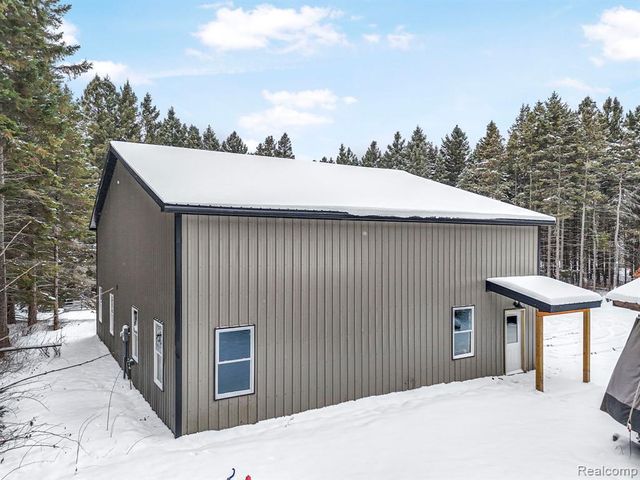 8074 Grosbeak Drive, Alden, MI 49612