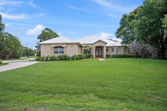 1106 SW Thoreau Court, Palm City, FL 34990