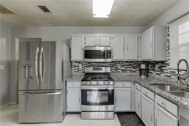 5160 Arrowind NW Road, Lilburn, GA 30047