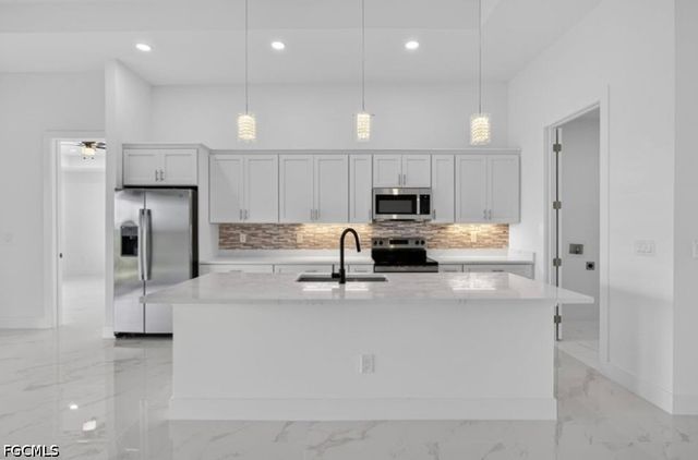 3007 62nd ST W, Lehigh Acres, FL 33971