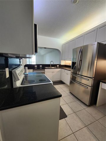 10710 NW 66th St 402, Doral, FL 33178