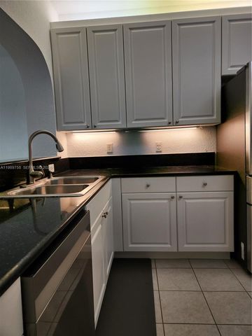 10710 NW 66th St 402, Doral, FL 33178