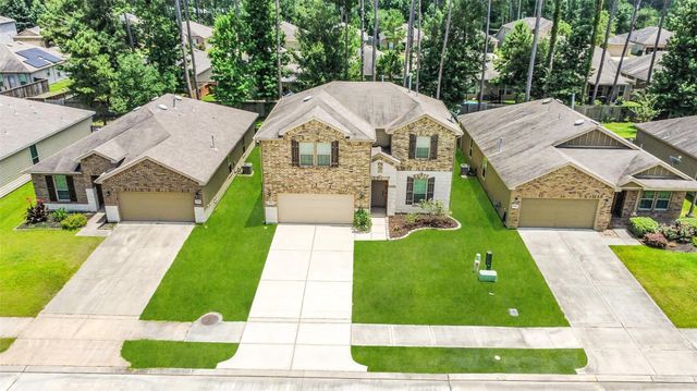 4299 Roaring Timber Drive, Conroe, TX 77304