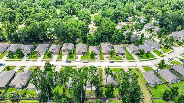 4299 Roaring Timber Drive, Conroe, TX 77304