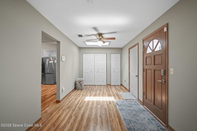 1416 Club Gardens Drive NE, Palm Bay, FL 32905