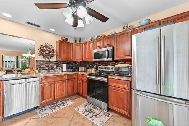 310 Elmira Court, Royal Palm Beach, FL 33411