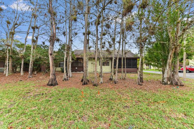 310 Elmira Court, Royal Palm Beach, FL 33411