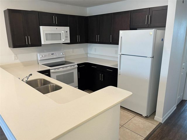 295 FLOWER LANE F, Kissimmee, FL 34743