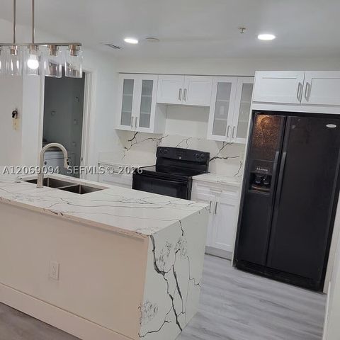 5840 W Sample Rd 302, Coral Springs, FL 33067