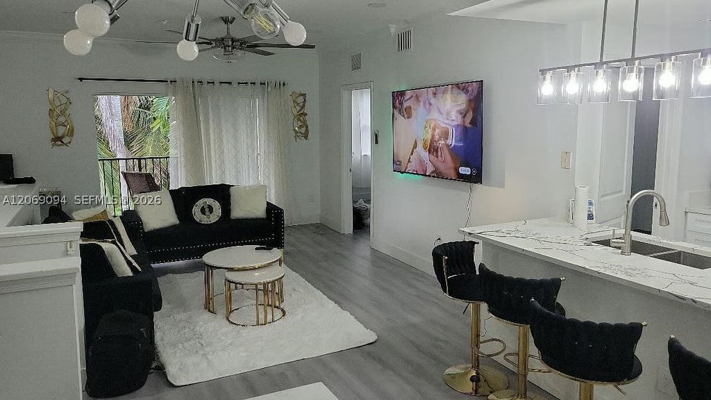 5840 W Sample Rd 302, Coral Springs, FL 33067