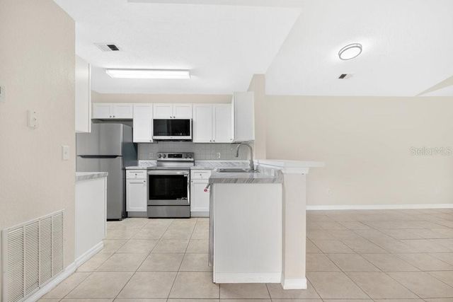 7606 PISSARRO DRIVE 14305, Orlando, FL 32819