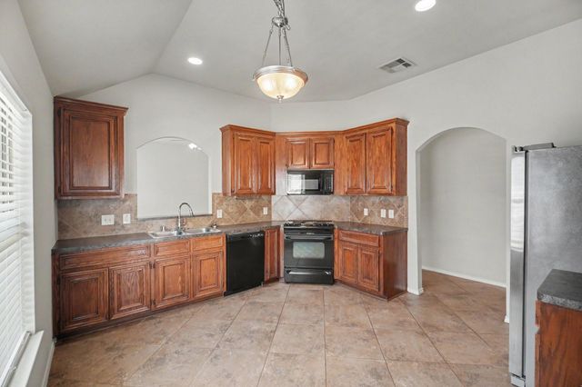 16523 Strathmore Manor Lane, Houston, TX 77090