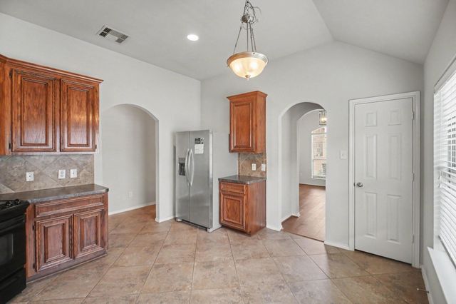 16523 Strathmore Manor Lane, Houston, TX 77090