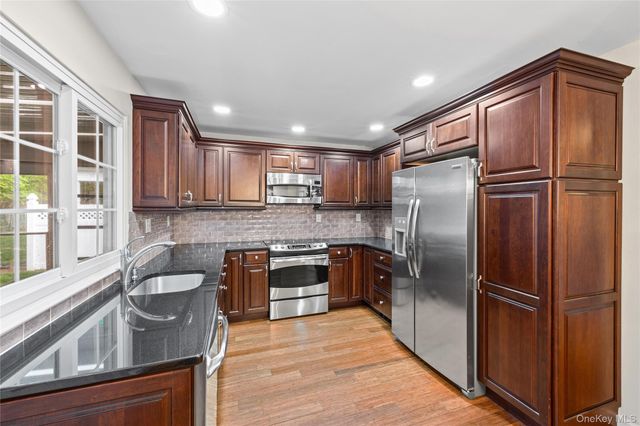 220 Belfast Lane, Ridge, NY 11961