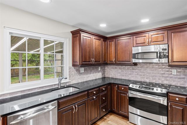 220 Belfast Lane, Ridge, NY 11961