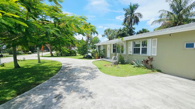 911 Burch Drive, West Palm Beach, FL 33415