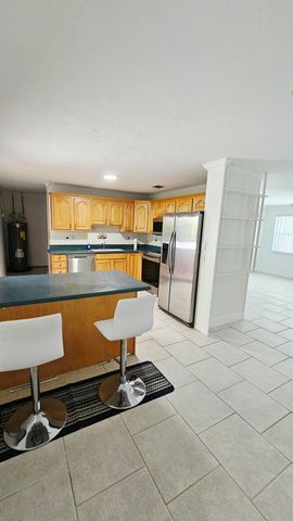911 Burch Drive, West Palm Beach, FL 33415
