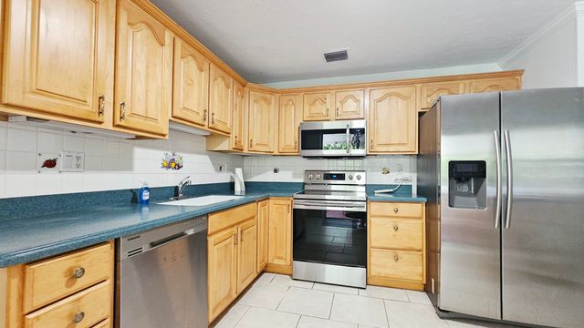 911 Burch Drive, West Palm Beach, FL 33415