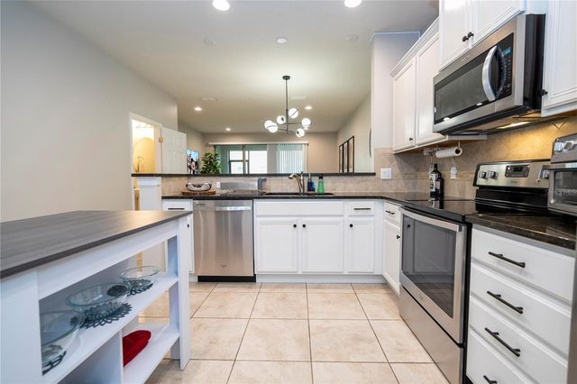 519 VIRTUOSO LANE 77, Orlando, FL 32824