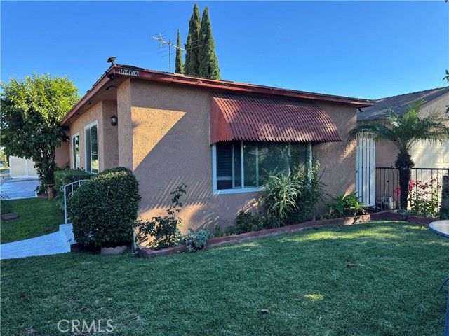 10406 San Carlos, South Gate, CA 90280