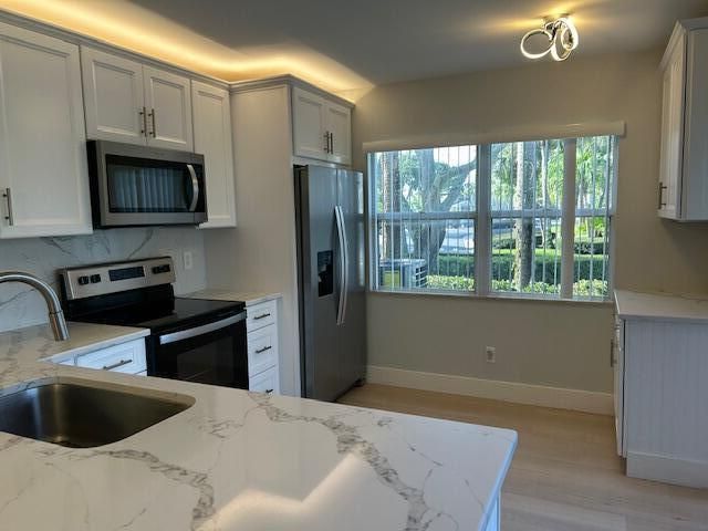2807 SW LAKEMONT Place 1, Palm City, FL 34990