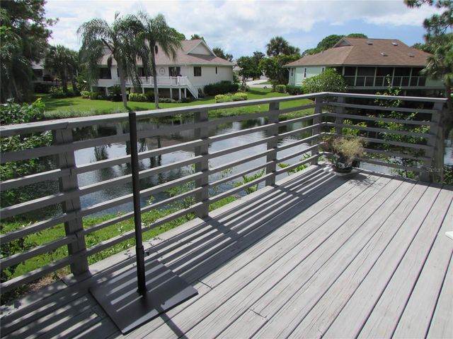 1013 LAKE AVOCA COURT, Tarpon Springs, FL 34689
