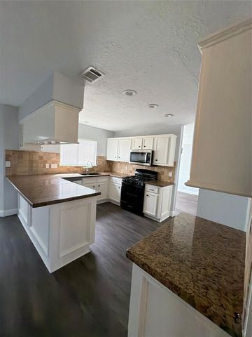 14202 Beau Harp Drive, Houston, TX 77049