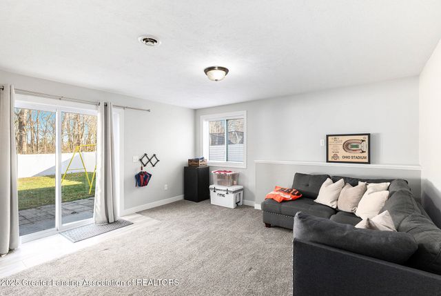 61 Lake Ridge Drive, Mason, MI 48854