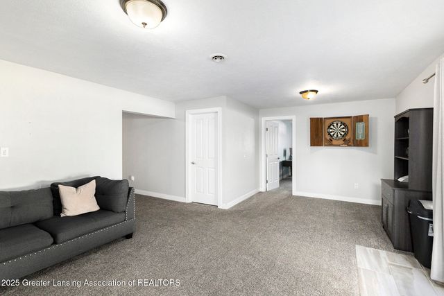 61 Lake Ridge Drive, Mason, MI 48854