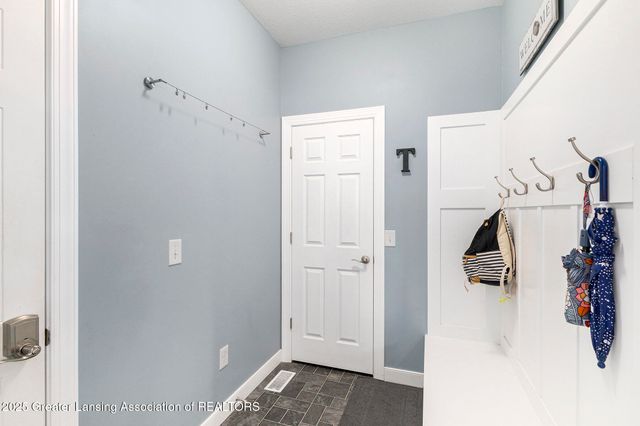 61 Lake Ridge Drive, Mason, MI 48854