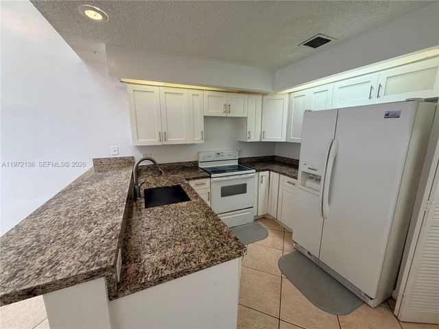 1818 Racquet Ct, North Lauderdale, FL 33068