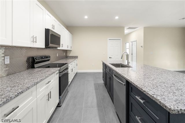 1043 Albert AVE, Lehigh Acres, FL 33971