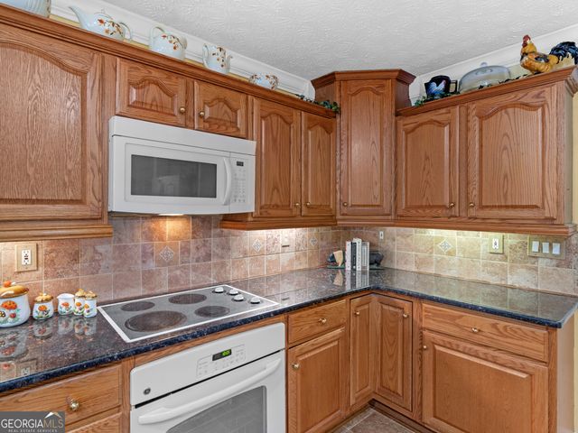 1220 Lake Stone Lea Drive, Oxford, GA 30054