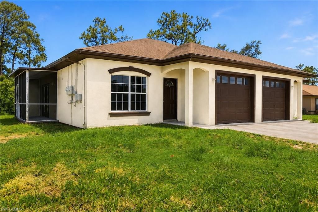 2433 George AVE S, LEHIGH ACRES, FL 33973 — exterior