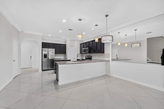 10306 WELLINGTON PARC Drive, Wellington, FL 33449
