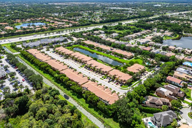 10306 WELLINGTON PARC Drive, Wellington, FL 33449