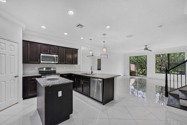 10306 WELLINGTON PARC Drive, Wellington, FL 33449