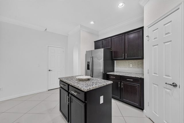 10306 WELLINGTON PARC Drive, Wellington, FL 33449