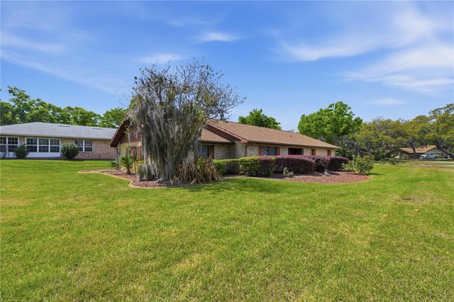 9704 WEDGEWOOD LANE, Leesburg, FL 34788