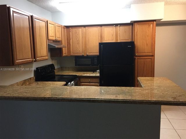 841 Lyons Rd 24201, Coconut Creek, FL 33063