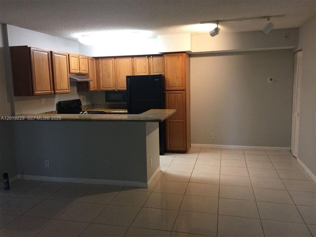 841 Lyons Rd 24201, Coconut Creek, FL 33063