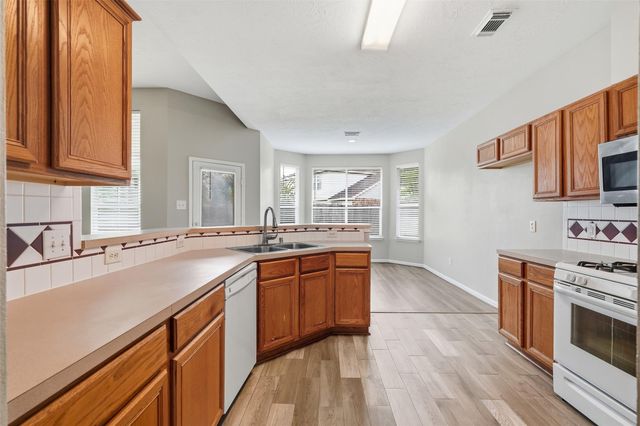 3003 Grey Mist Court, Friendswood, TX 77546