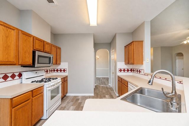 3003 Grey Mist Court, Friendswood, TX 77546
