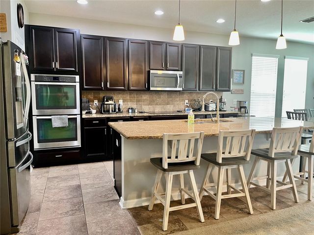 1033 FOUNTAIN COIN LOOP, Orlando, FL 32828