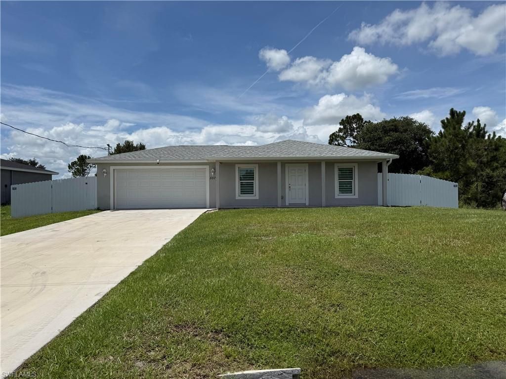 557 Oakshire LN, LEHIGH ACRES, FL 33972 — exterior