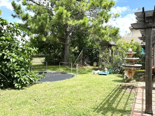 10103 Heron Meadows Drive, Houston, TX 77095