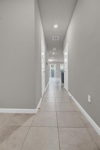5659 Enclave Drive, Mangonia Park, FL 33407
